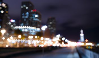 Blurry image of San Francisco buildings at night