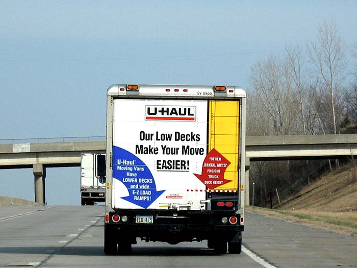Back view of Uhaul truck on freeway