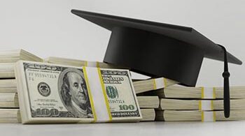 Picture of money and a college graduation cap