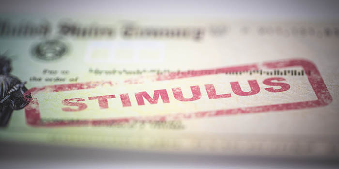 A 2020 stimulus check with the word "Stimulus" stamped on it in red.